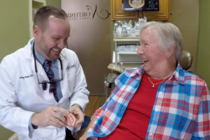 John Shanks, DDS with patient smiling together
