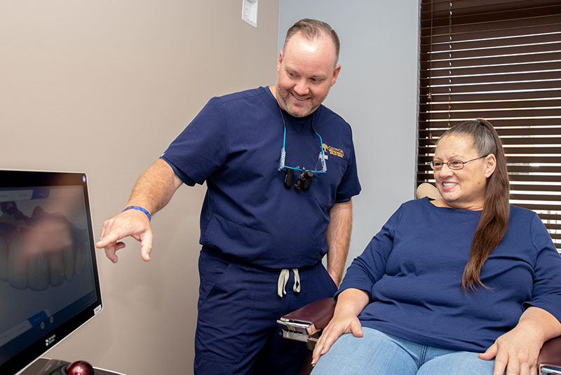 Dental patient talking with Dr. Shanks