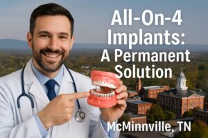 Image of a dentist smiling while pointing to All-on-4 dental implants on a patient's model mouth, with McMinnville, TN in the background, text on the image says "All-On-4 Implants: A Permanent Solution"